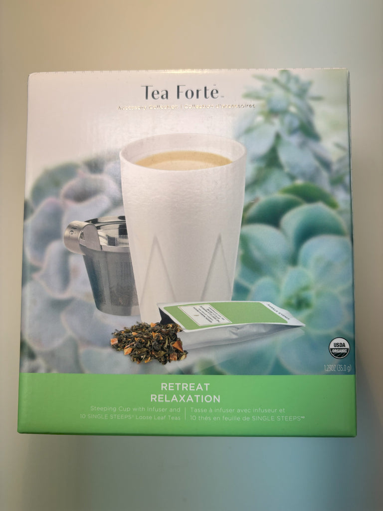 9. White Cup, Strainer & Tea